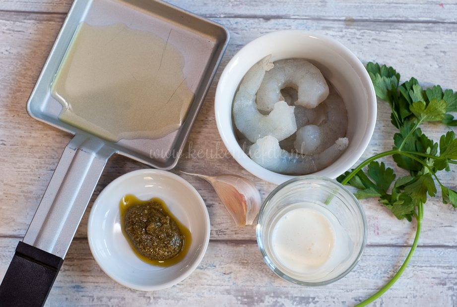 Gourmetpannetje: knoflook garnalen in pesto roomsaus Gourmetpannetje: knoflook garnalen in pesto roomsaus