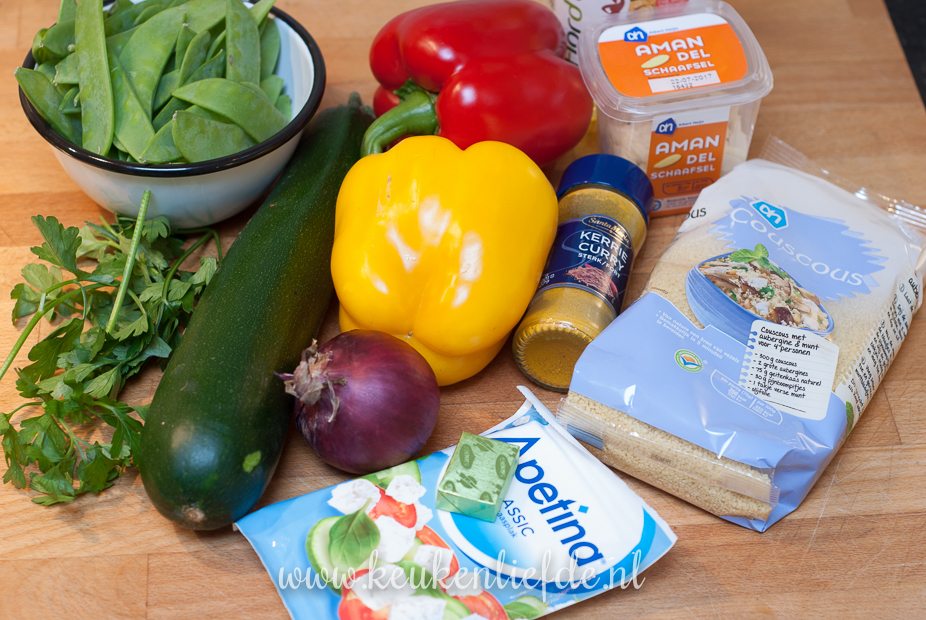 Vega kerst: couscous met kerrie en warme feta Vega kerst: couscous met kerrie en warme feta