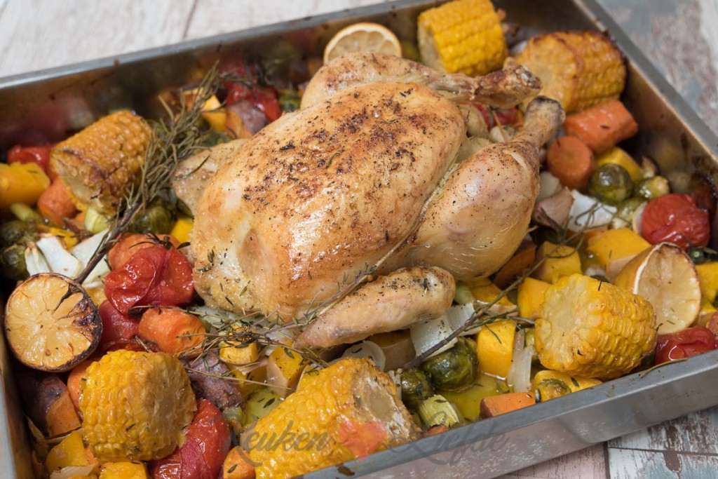 Hele kip uit de oven met wintergroenten