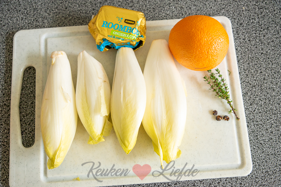 Gesmoorde witlof in sinaasappelsaus