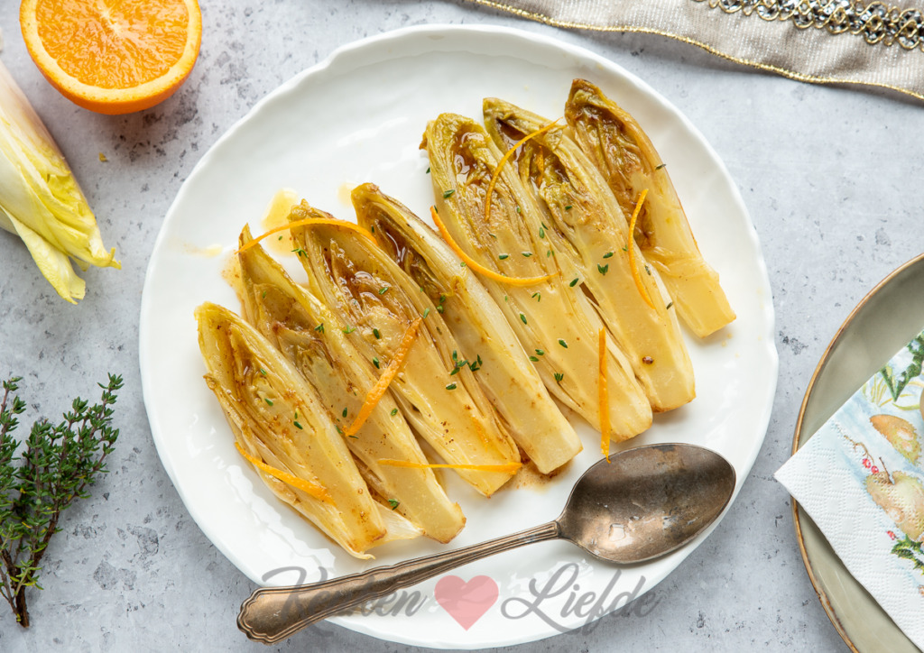 Gesmoorde witlof in sinaasappelsaus Gesmoorde witlof in sinaasappelsaus