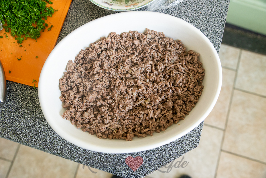 Rodekoolschotel met gehakt en puree