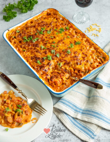 Strooi de kaas erover en bak in de oven